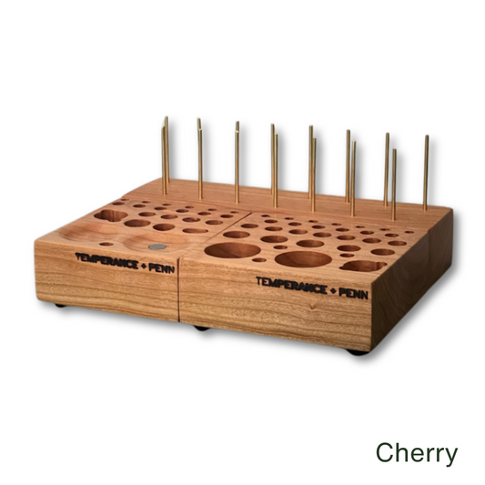 The ultimate fly tying tool caddy by Temperance & Penn—every fly tier’s dream workstation. Crafted from cherry wood with an integrated thread holder, this modular system adapts to any fly tying setup. The three-piece design separates and reconfigures effortlessly, while hidden magnets ensure seamless reassembly for compact storage. Precision-cut slots accommodate spools, bobbins, and essential tools, making this the must-have fly tying organizer for serious anglers.
