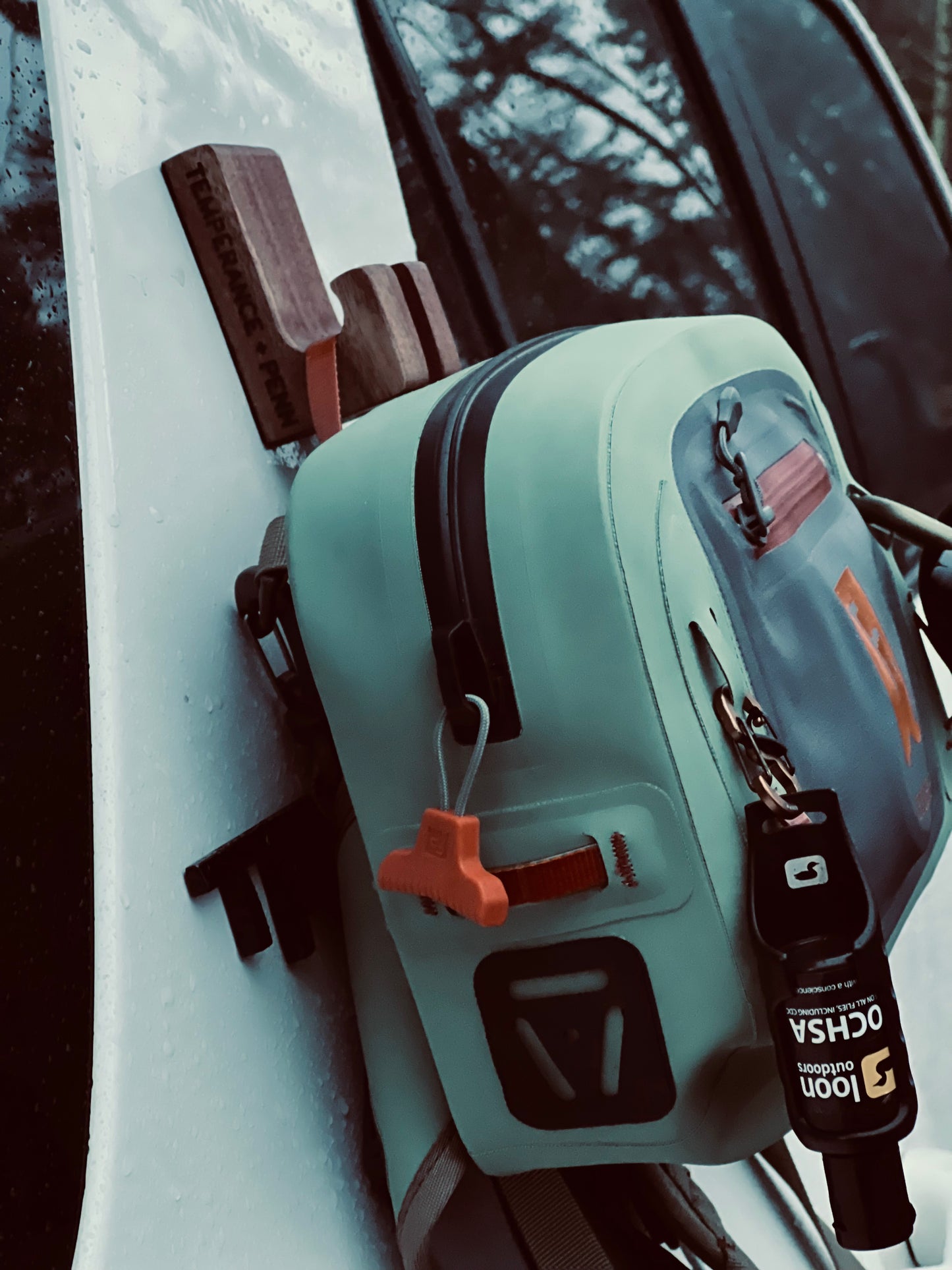 GearHook magnetic holder attached to a vehicle, keeping you gear clean, dry and off the ground. ideal for anglers, campers, and outdoor enthusiasts seeking versatile storage solutions.