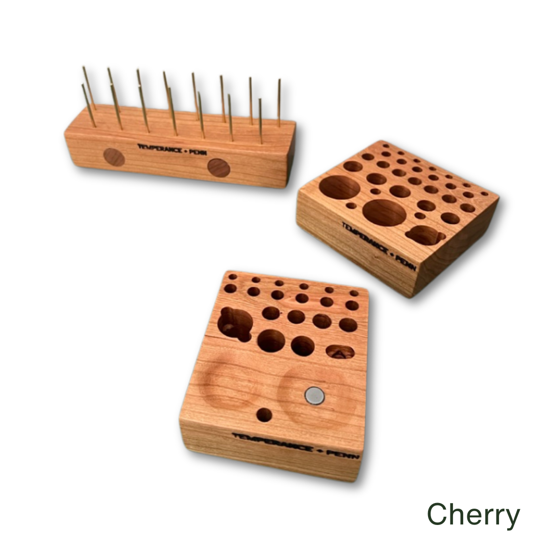 The ultimate fly tying tool caddy by Temperance & Penn—every fly tier’s dream workstation. Crafted from cherry wood with an integrated thread holder, this modular system adapts to any fly tying setup. The three-piece design separates and reconfigures effortlessly, while hidden magnets ensure seamless reassembly for compact storage. Precision-cut slots accommodate spools, bobbins, and essential tools, making this the must-have fly tying organizer for serious anglers."