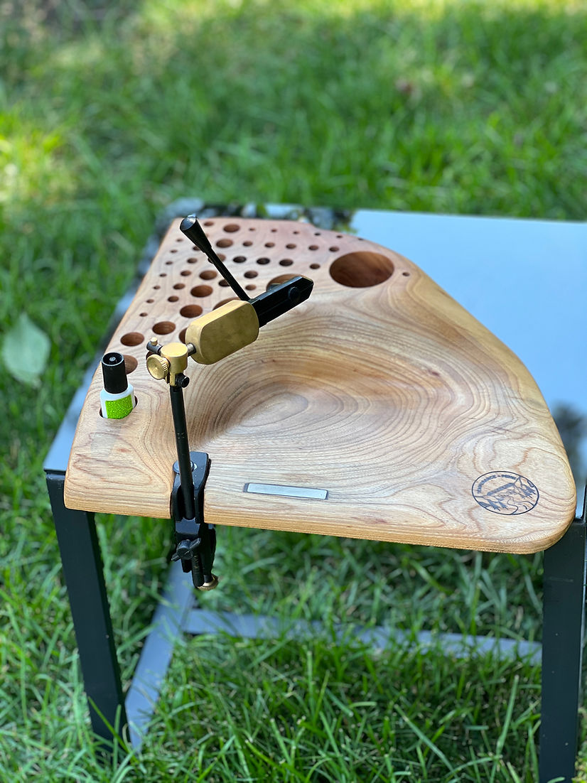 Custom Fly tying bench carved from a lived edge piece of cherry