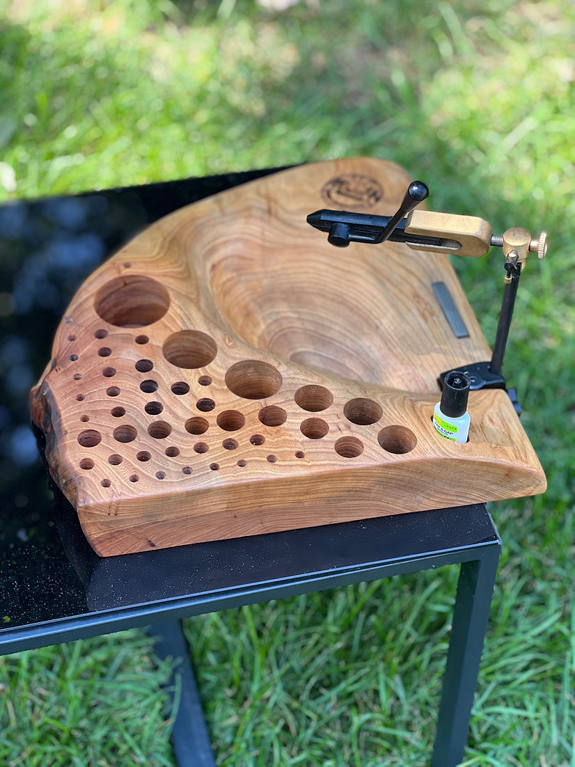 Custom Fly tying bench carved from a lived edge piece of cherry