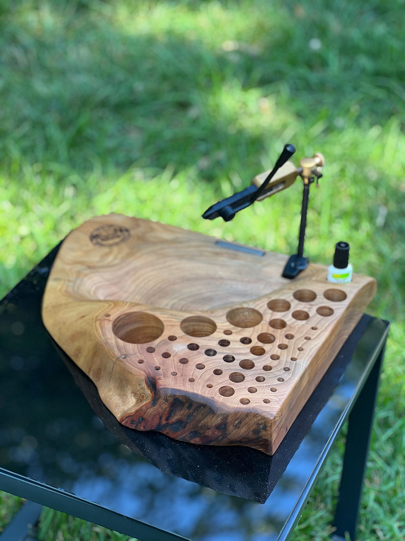 Custom Fly tying bench carved from a lived edge piece of cherry