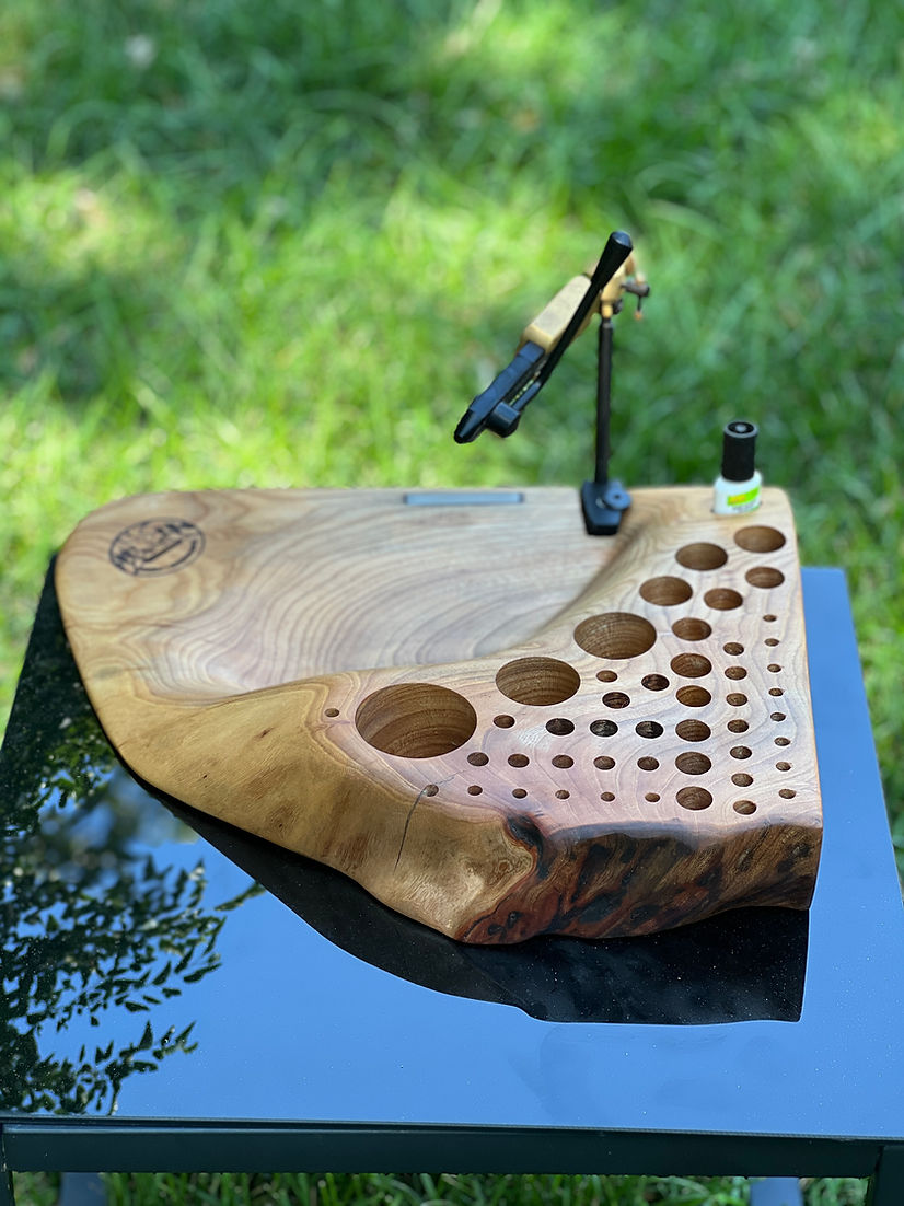 Custom Fly tying bench carved from a lived edge piece of cherry